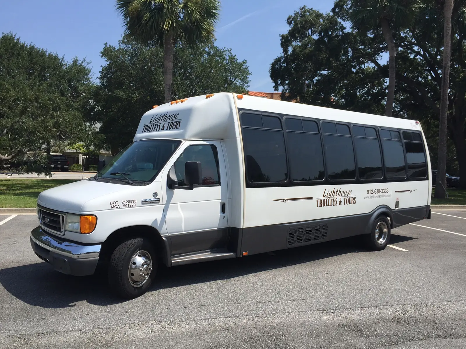 One of our white executive buses