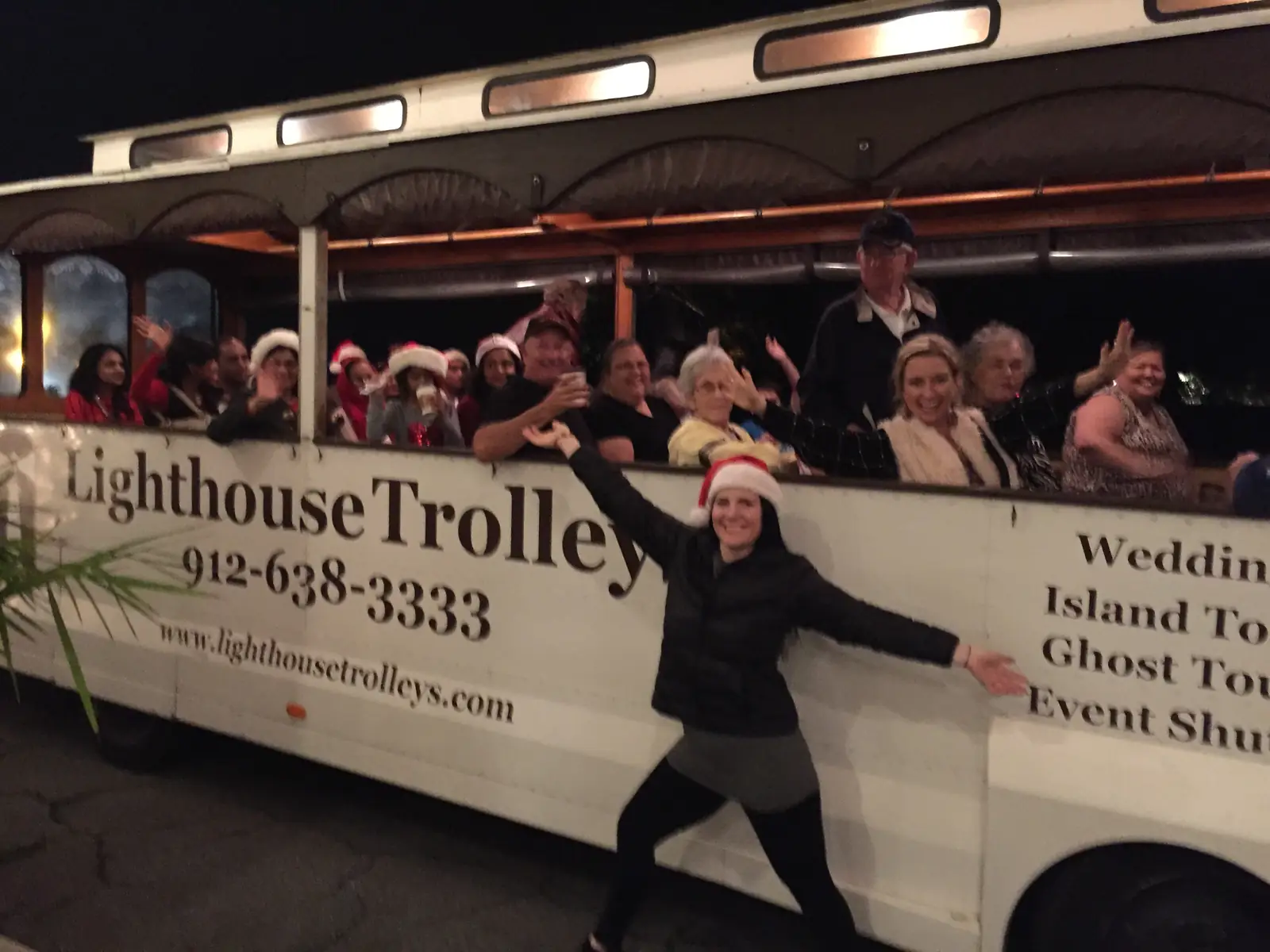 Guests aboard a trolley for the Christmas Tour of Lights