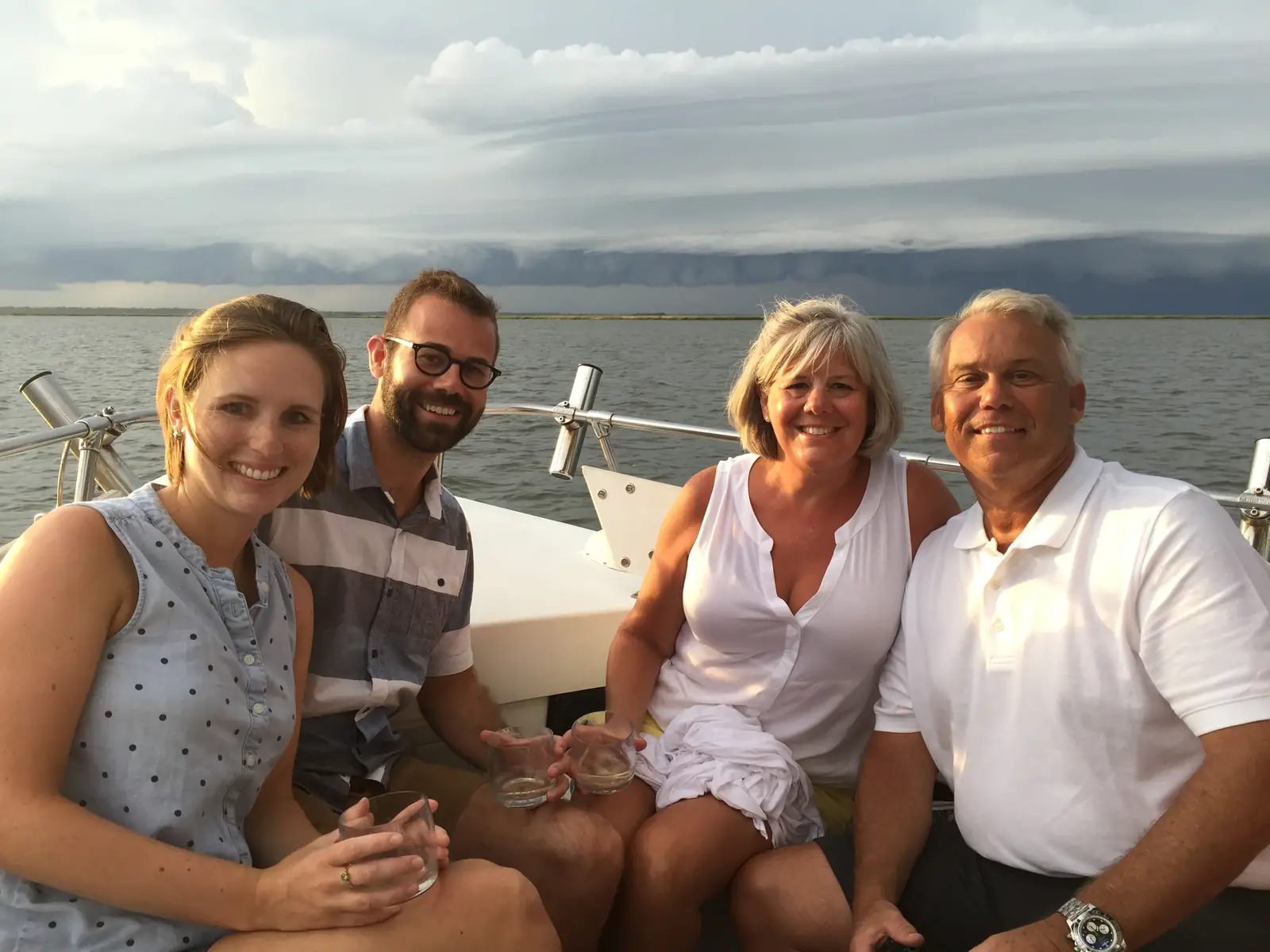 Guests smiling on deck during a boat tour