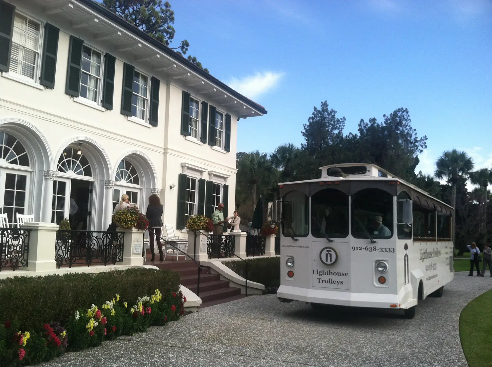 Our trolley parked in front of a historic Jekyll Island cottage