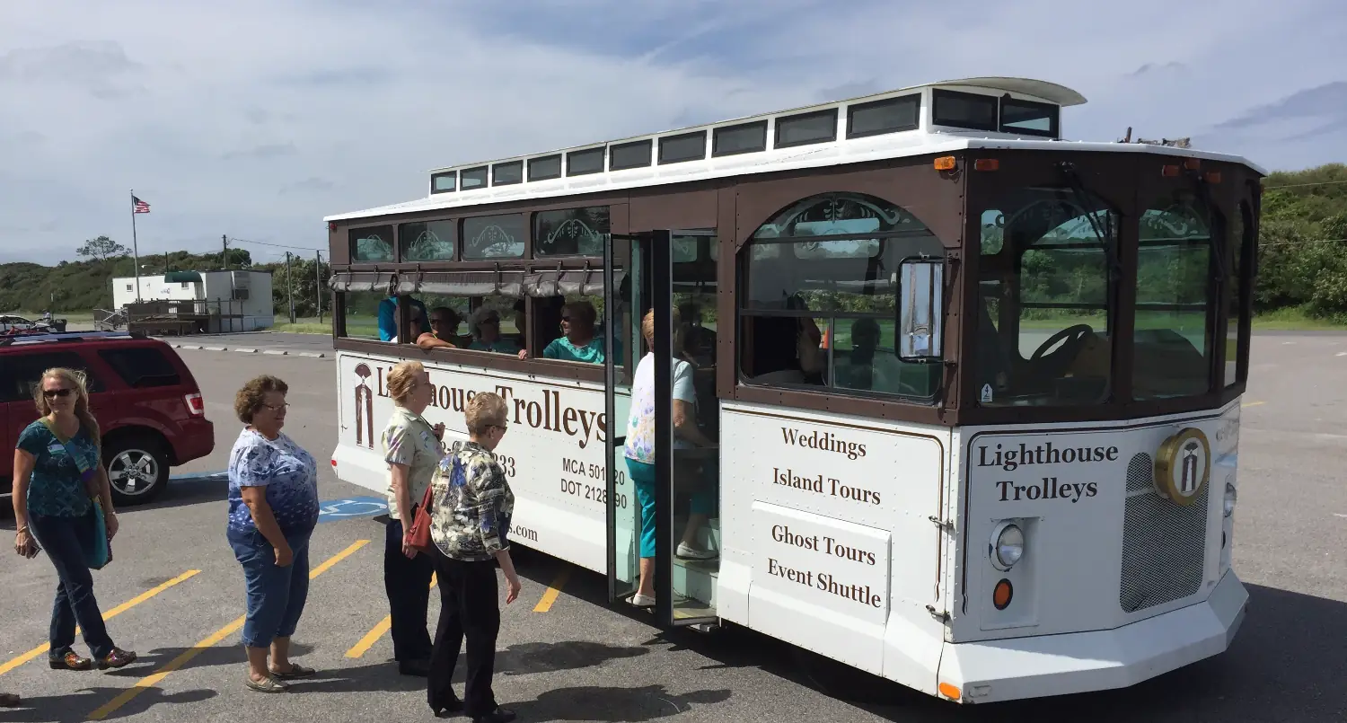 Guests gathering at the trolley before a tour